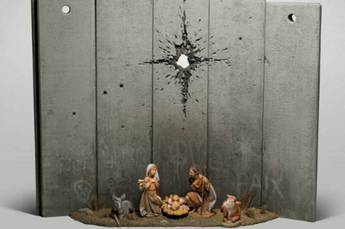 Muri e fori di proiettile come stella cometa: il presepe di Banksy fa discutere